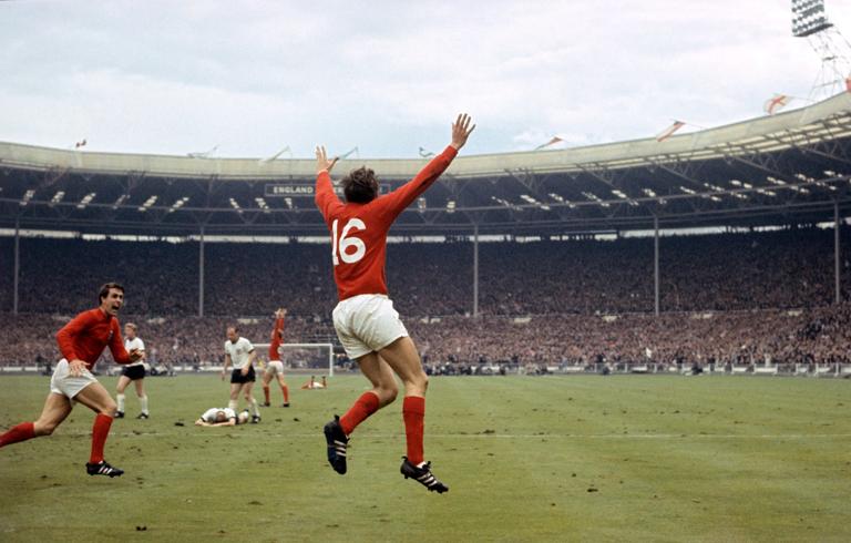 30/7/66: A LIBRARY FILE PICTURE OF MARTIN PETERS CELEBRATING AFTER SCORING ENGLAND'S SECOND GOAL DURING THE WORLD CUP FINAL AT WEMBLEY IN LONDON AGAINST WEST GERMANY. ENGLAND WON THE MATCH 4-2.   (Photo by PA Images via Getty Images)